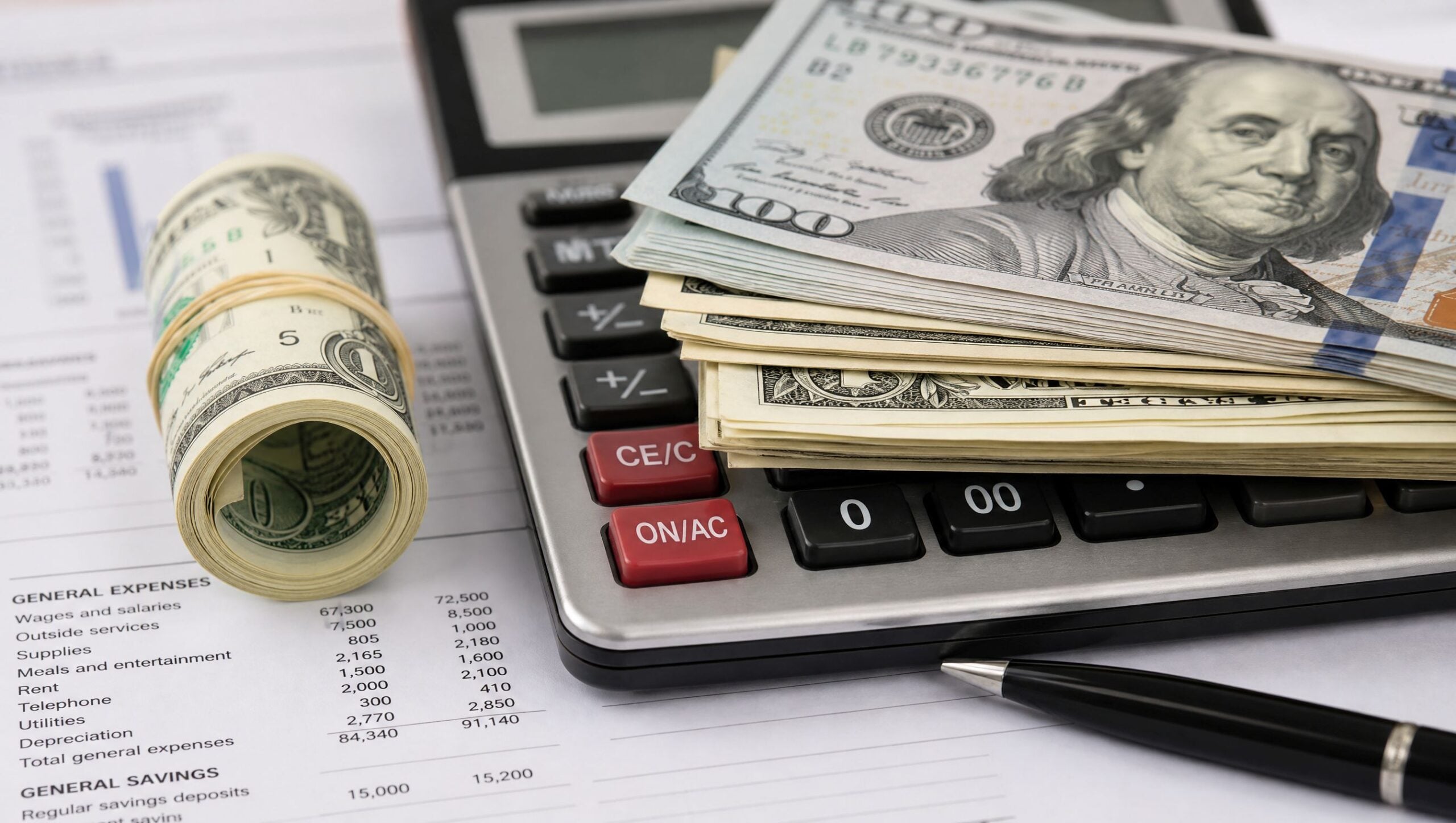 Cash and a calculator on a financial statement, the arithmetic behind what an annuity withdrawal actually costs after the surrender charge.